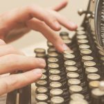 pic of woman typing on old typewriter county court typing up a judge's order property118