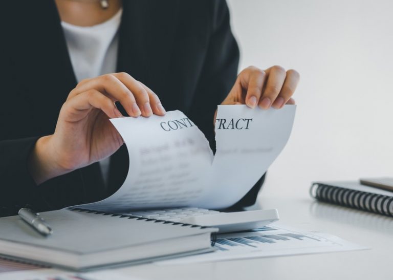 Pic of woman landlord tearing up an ast contract property118