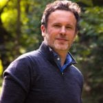 Property expert outdoors discussing rising UK rent prices