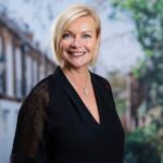 Verona Frankish, Yopa chief executive, smiling during a professional portrait.