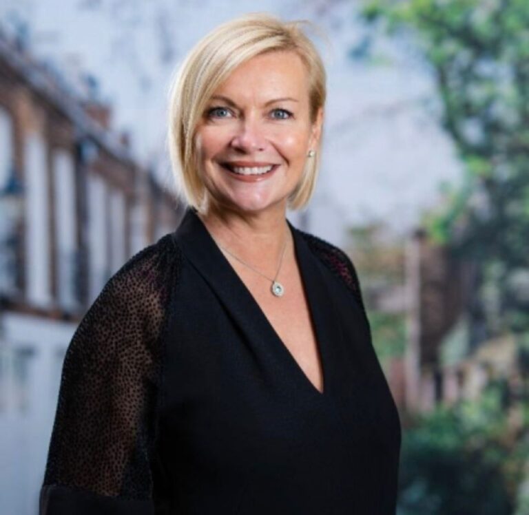 Verona Frankish, Yopa chief executive, smiling during a professional portrait.