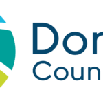 The Dorset Council logo with the words and graphic