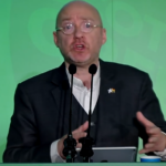 Green Party MSP speaking at press conference on rent control policies in Scotland