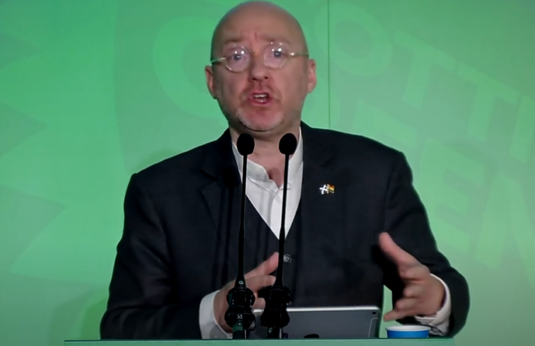 Green Party MSP speaking at press conference on rent control policies in Scotland