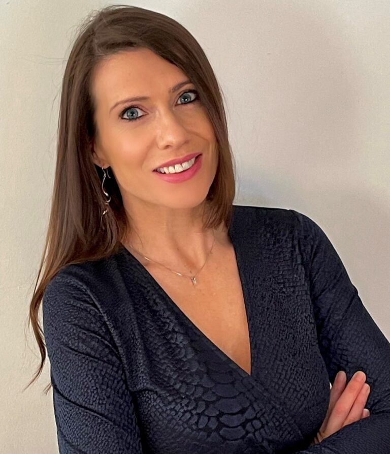 Woman smiling in professional portrait for property market news article