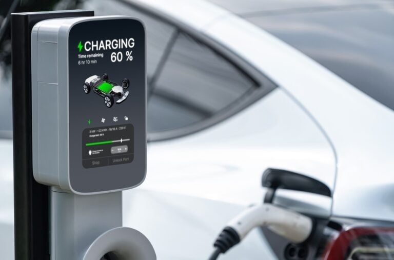 EV charging point powering an electric car at a residential property