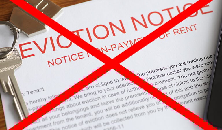 Eviction notice with red cross symbolizing dispute over Section 21 and rent arrears eviction