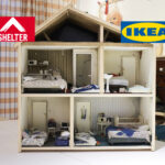 Dollhouse exhibit illustrating cramped and unsafe conditions faced by children in temporary accommodation