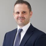 Business professional in suit representing new BTL mortgage product launches