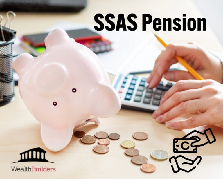 Upside-down piggy bank with scattered coins beside a calculator to illustrate SSAS pension finance