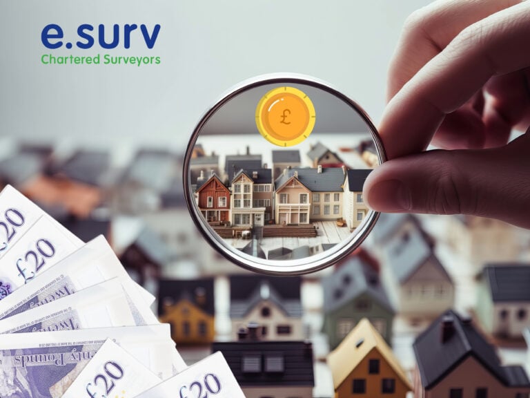 Magnifying glass focusing on house values with UK banknotes and e.surv branding, illustrating falling property prices.