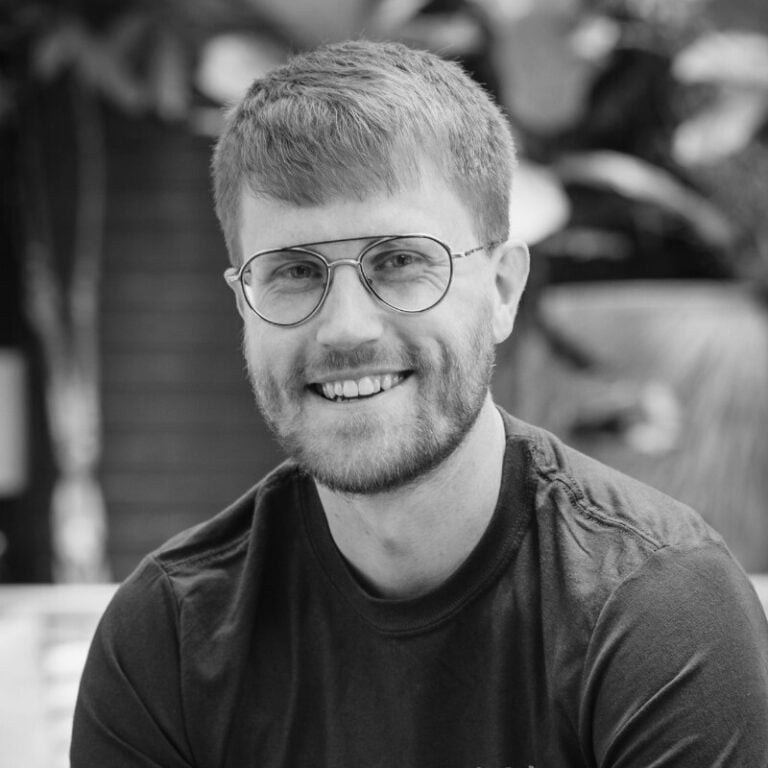 Smiling professional in glasses representing expert commentary on London landlord licensing fines