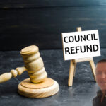 Council refund sign next to a judge’s gavel representing a tribunal ruling