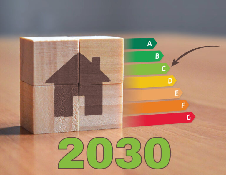 Wooden blocks forming a house beside EPC energy rating chart with 2030 target highlighted.