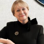 Executive posing confidently in a professional setting related to rental market growth