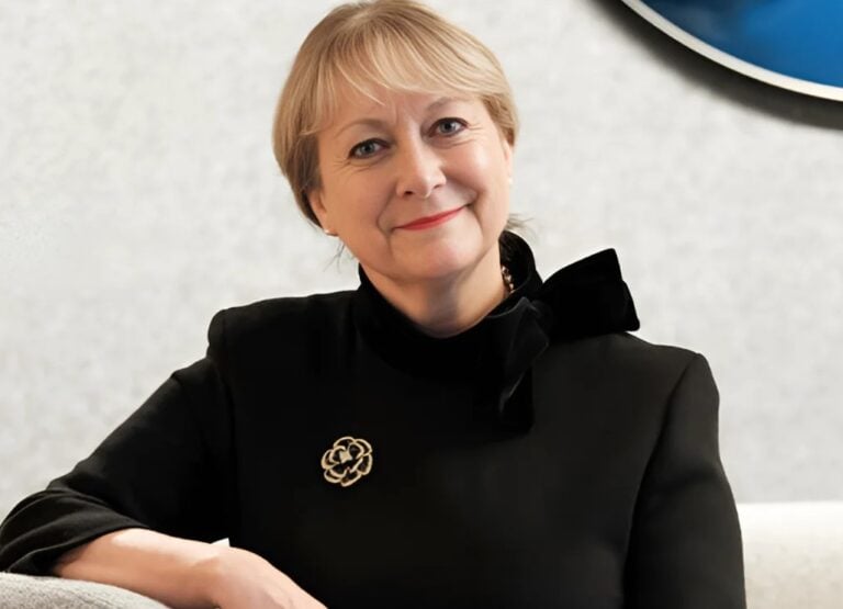 Executive posing confidently in a professional setting related to rental market growth