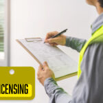 Person completing property inspection paperwork for HMO licensing compliance