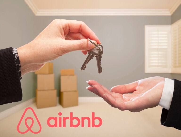 Handing over keys symbolising Airbnb sub-letting scheme for rental properties.
