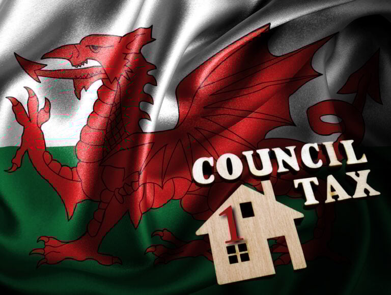Welsh flag with house and “Council Tax” text symbolizing reforms for HMO council tax in Wales