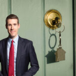 Housing Minister stands beside house key in door discussing Renters’ Rights Bill and landlord sector stability