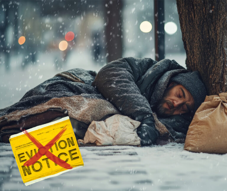 Homeless man sleeping outside in winter with eviction notice crossed out