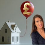 Model house with pound symbol balloon symbolizing rising UK property prices
