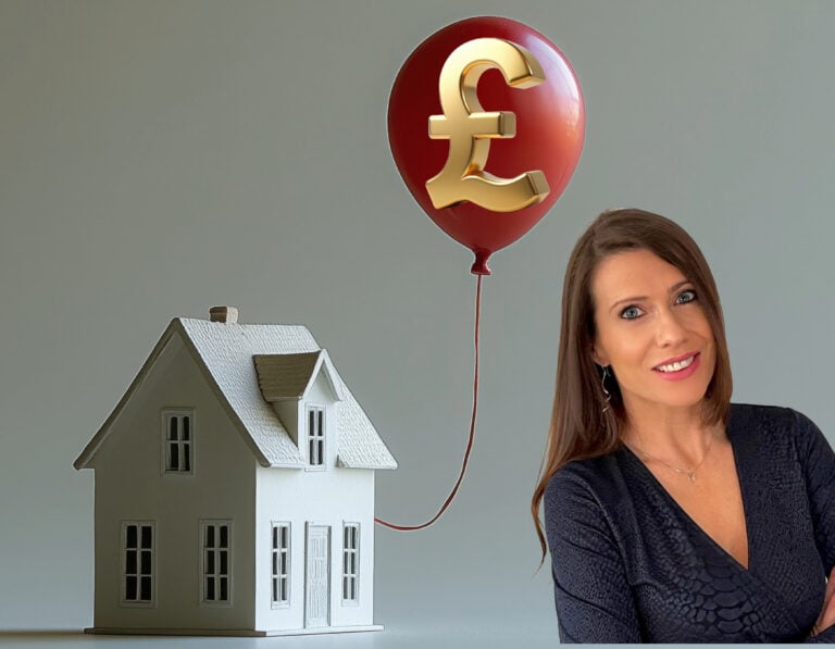 Model house with pound symbol balloon symbolizing rising UK property prices