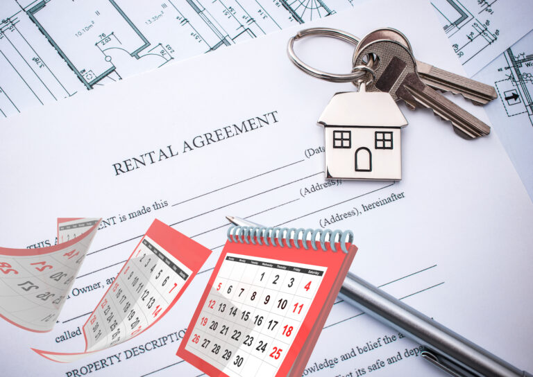 Rental agreement with house keys and calendar representing tenancy terms
