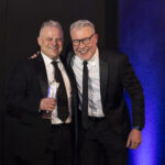 Paul Shamplina celebrates winning Seminar Speaker of the Year 2024 with Ian Collins at awards ceremony