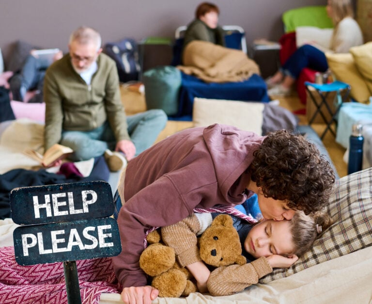 Family in temporary shelter seeking housing support during crisis