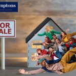 Group of buyers rushing toward a house for sale amid stamp duty changes