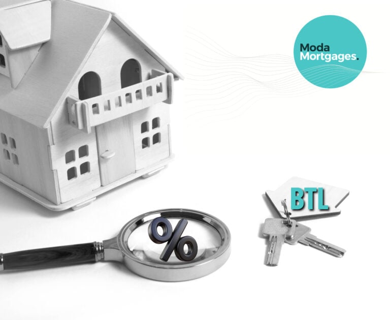 Wooden house, keys with BTL label, and magnifying glass with percent symbol representing buy-to-let mortgages
