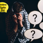 Worried landlord with question marks surrounding Renters Rights Bill uncertainty