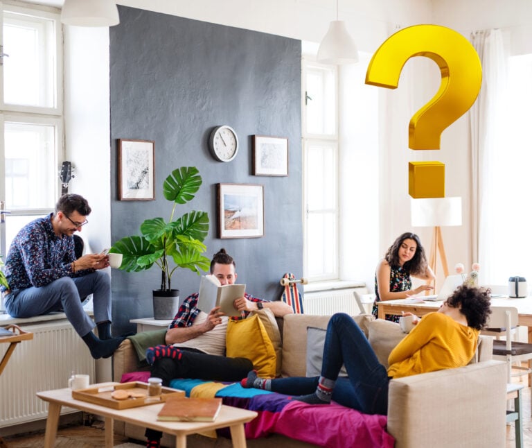 Students in shared house discussing changes to HMO tenancy agreement