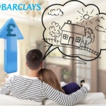 Couple dreaming of homeownership with rising housing costs shown by blue pound arrow.