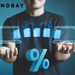 Digital product transfer concept with laptops, files, and percentage symbol representing Landbay’s new BTL service