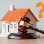 Gavel and house model with question mark symbolizing lease dispute after leaseholder’s death