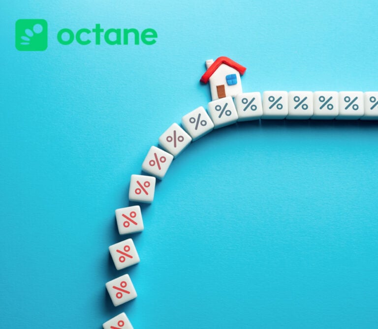 House model with percentage blocks representing falling mortgage rates