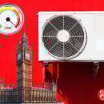 Heat pump with Parliament and energy risk meter highlighting Labour policy debate
