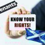 Hand holding a card reading “Know Your Rights” with Scottish flag symbolising tenant protections