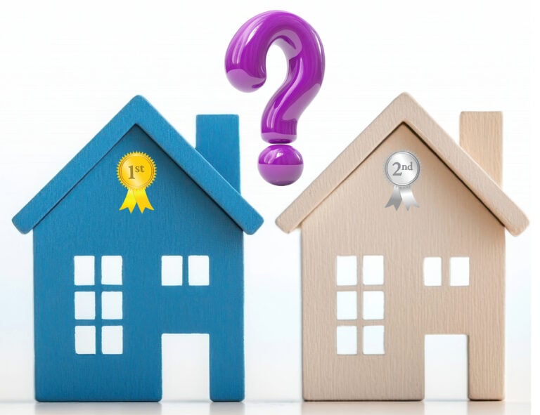 Two model houses with a question mark inbetween