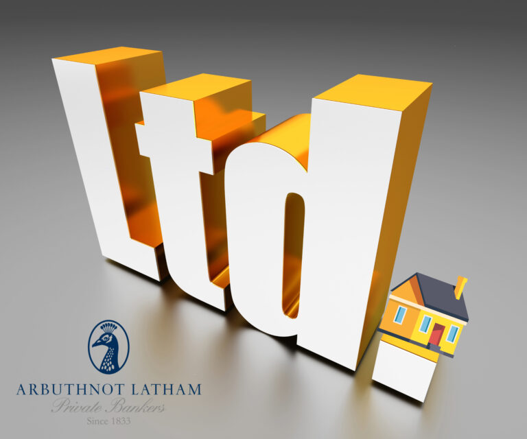 LTD company sign and a small house