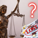 A question mark, court documents and Justice scales