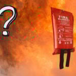 A fire blanket and a question mark with a fire blazing in the background