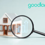 Magnifying glass over a house with rising rent graph and Goodlord logo.