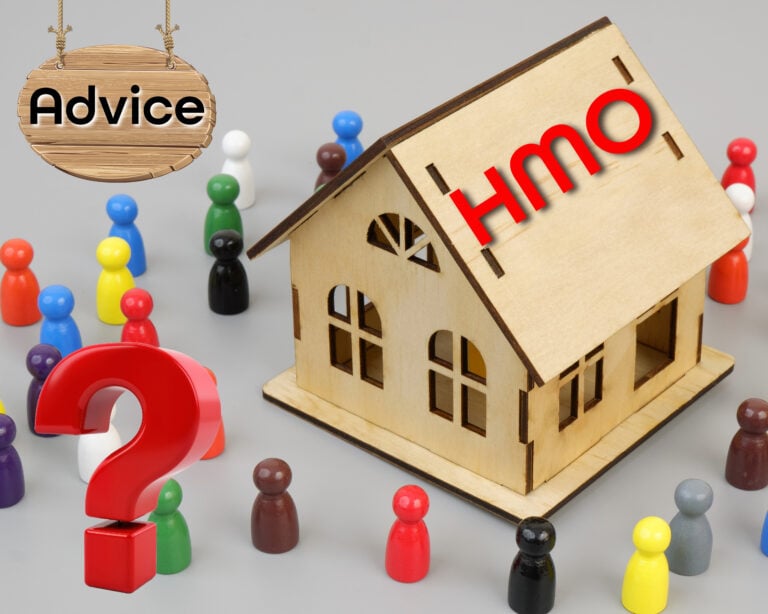 Multi coloured small figures surrounding a wooden model house with HMO on the roof and a red question mark