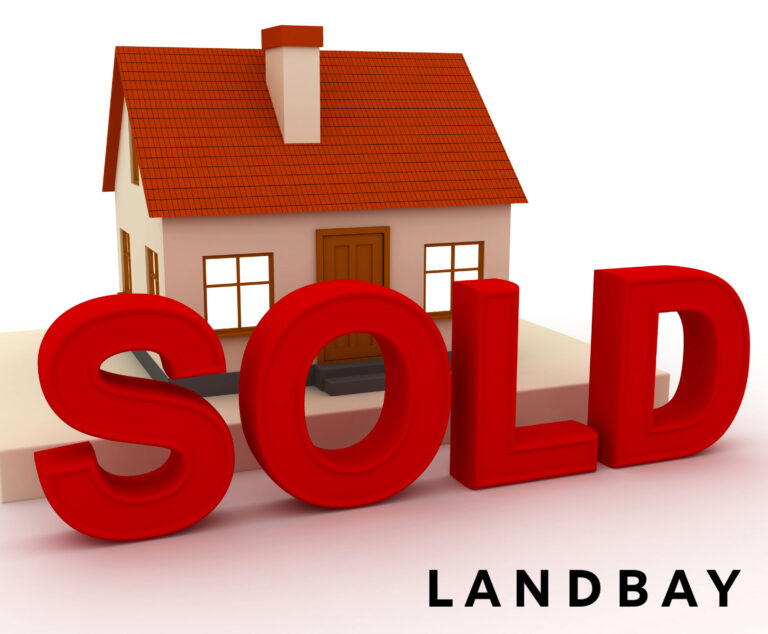 3D red "SOLD" sign in front of a model house with Landbay branding.