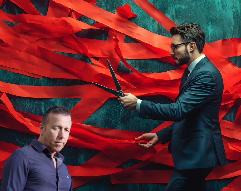 A man cutting red tape