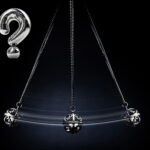 A pendulum swinging and a question mark on a black background