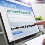 Person completing Propertymark leasehold survey on a computer screen